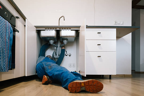 Professional Plumbing technician working in Syosset, NY